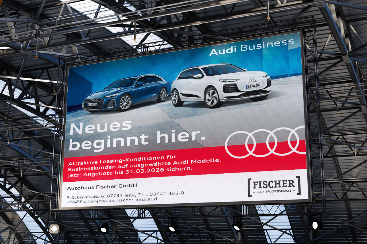 Außenwerbung Audi Business LED-Großflächenwerbung fürs Autohaus Fischer Jena: zwei Audi Modelle, Claim „Neues beginnt hier“ und Leasing-Angebote für Geschäftskunden